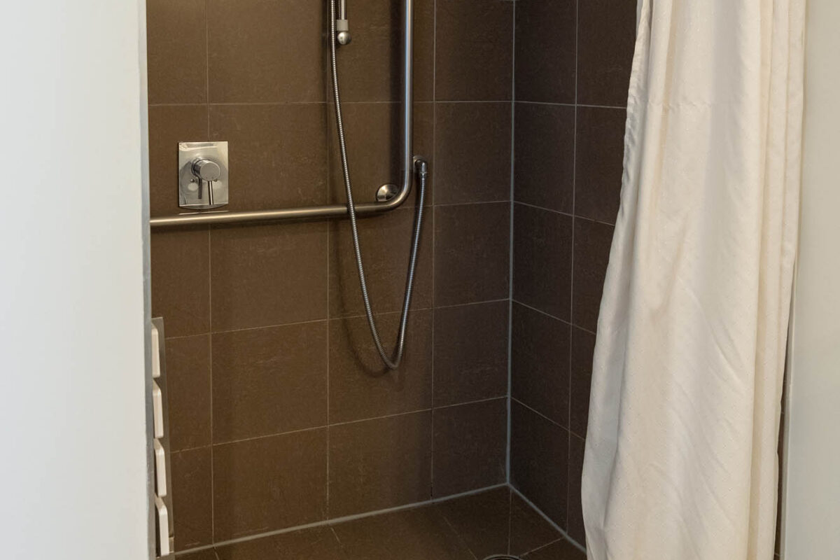 Accessible Shower - Boulcott Suites 1 Bedroom Apartment South Tower For Village Accommodation Group. Photo credit: Stephen A’Court. COPYRIGHT ©Stephen A’Court